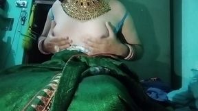 indian gay crossdresser gaurisissy pressing his boobs so hard and enjoying in green saree