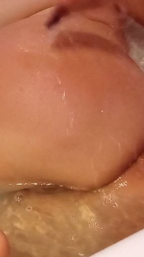 I masturbate in the jacuzzi, letting all the water enter my pussy and my ass, and I have a really good orgasm.   Clip 1