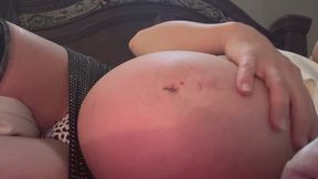 Milf Rubbing Pregnany Belly And Watching It Move