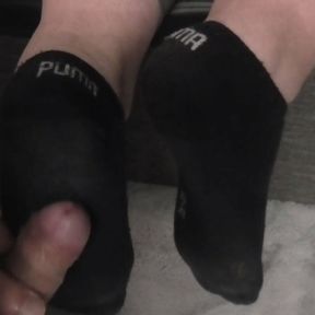 sockjob in black dirty puma socks