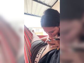 Slutty Colombian hotty takes out her boyfriend's dick on the street and sucks it