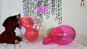 Mrs Claus takes her balloons to the limit and plays bouncing them