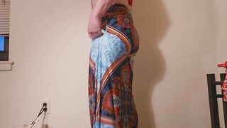 Attempting on different skirts in my g-string which one is lovelier?