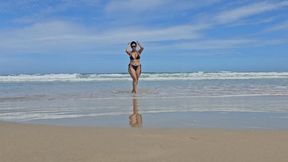 Milah Arches crossing her sublime legs in the Beach