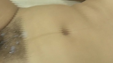 After enjoying the beach with my stepson, we go to the hotel to masturbate and he cums on my hairy pussy
