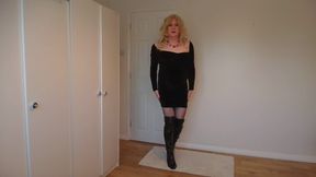 Stripping out of my black dress in fishnets and boots