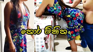 A Sri Lankan brunette shares a secret kitchen embrace with her lover