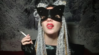 Catwoman smokes and flirts with you