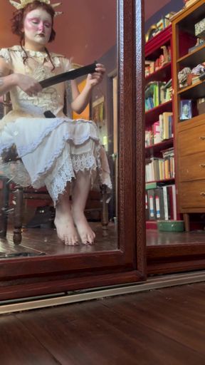 Dirty foot clown girl shows off her socks