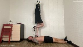 I'm testing My new heels on My pathetic slave