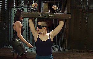 Bound lesbian is spanked and fucked