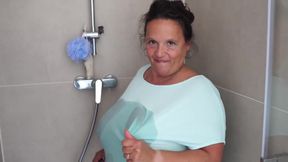 Mature Brunette with Massive Tits Gets Steamy in the Shower