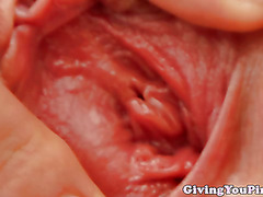 Masturbating slut toying her slit
