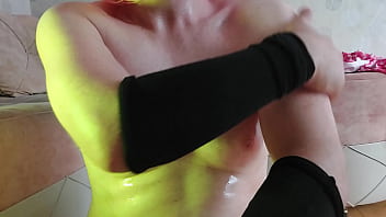 Thigh-High Tease, Crossdresser Glides Hands Over Glistening Slick Body