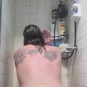 Chubby white guy Neil sucks and fucks dildo in the shower