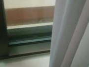 Shemale Cumming in Casino Window while Watching Workers Make Her Omlet