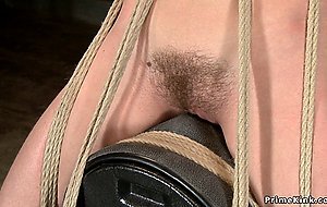 Tied and tapped babe is toyed