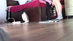 Amateur wife dancing naked at home. Amateur woman has fun trying on clothes and cutting them.