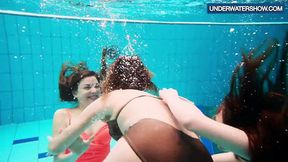 Three sizzling beauties dive into a shared pool of passion