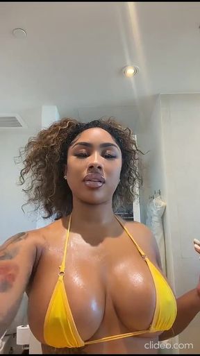 Natural big-titted beauty flaunts her assets