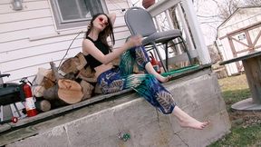 amateur hippie girl starshine posing nude and barefoot on tractor