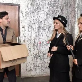 Two blonde milf police officers arrest a guy and take him to the back alley for a threesome