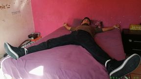 Young Latino Ricky Gets Tied Up In A Humiliating Position On The Bed - Now He Has No Other Choice Than Enduring The Endless Tickling On His Upper Body, Feet, Balls & Cock - That's How We Like It! :-P
