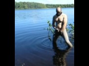 jerking off in lake wearing spandex tights, latex gloves and stocking mask