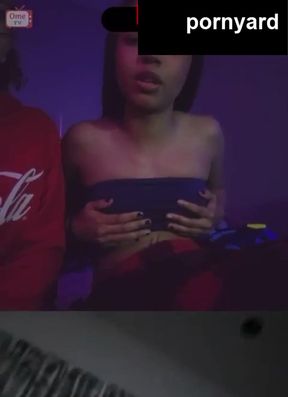 Webcam teen gets caught on cam while reacting to homemade porn