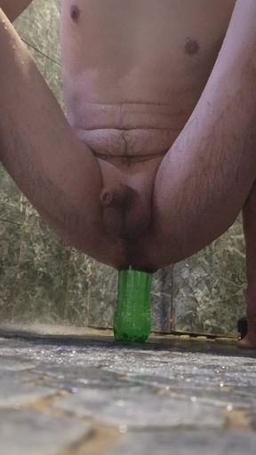 A bottle in the ass