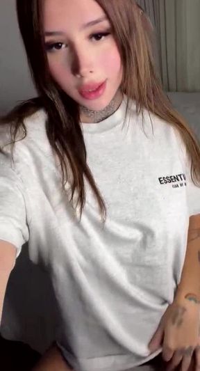 Amateur teen shows off her tits in a playful scene