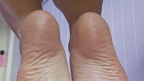 Quick, your GF is in the other room. Let my oiled soles take care of you