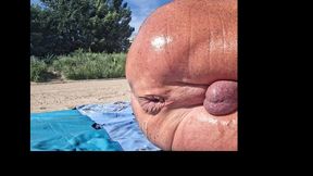 Key West stretching his hole with Big Ben at the beach