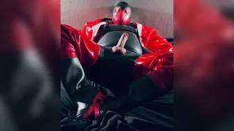 Twink in Red Latex Waders and Gloves Pumps His Huge Cock