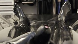 Cumshot with rubber cock sheath