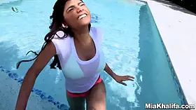 Mia Khalifa - chilling out in the pool with Sean Lawless