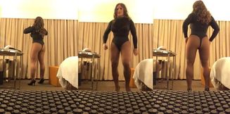 Romina's Gyrations in a feminized fetish mask with pantyhose and heels