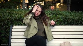 Young Brunette Is Taking an Unhurried Stroll with Allwhite 120mm Cigarette