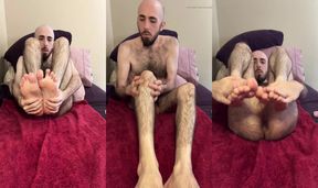 Skinny bearded uncut white guy oiling up my very hairy legs, feet, and ass on the bed