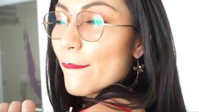 Latina with a Sensual Body Posing in Her Latex Skirt