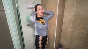 Cute and tender girl wetting all her clothes in the shower 5