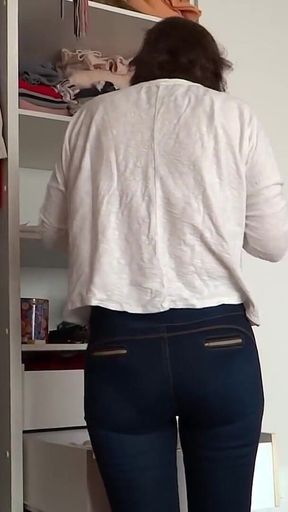 After Urinating, the Stepmother Puts on Very Tight Jeans, Revealing Her Panties
