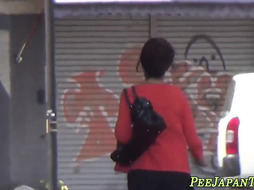 Japanese hottie urinating on street