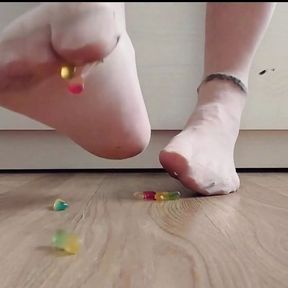 Nylon feet have fun with fruit gum  crushing