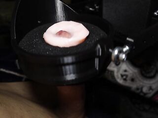 Testing the automatic masturbator anew and groaning passionately from the hard movements!