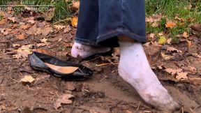 Amelie wrecks her ballet flats and white socks in the mud