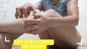 Lola scratches her legs intensely.