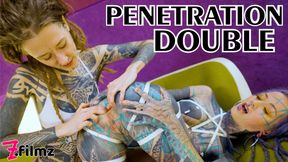 Tattooed hotties fuck each other with crazy toys