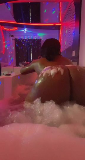 Big Black booty bouncing in Hot Tub