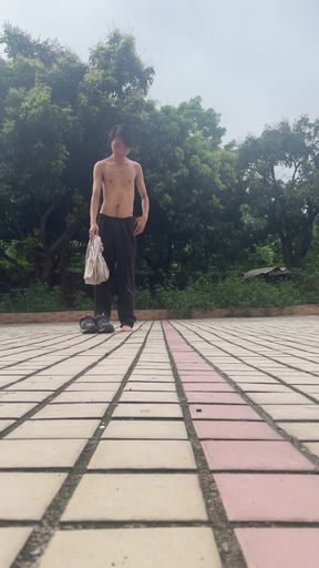 A young man publicly displays his erect penis.